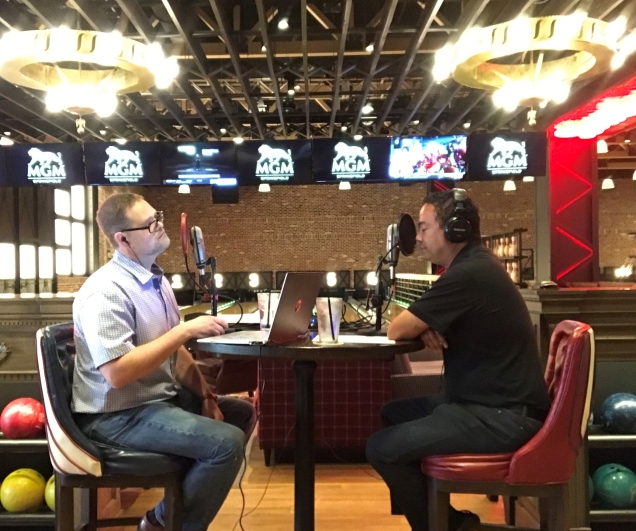 Chris DiMauro and Michael Mathis chat inside tap Sports Bar.
